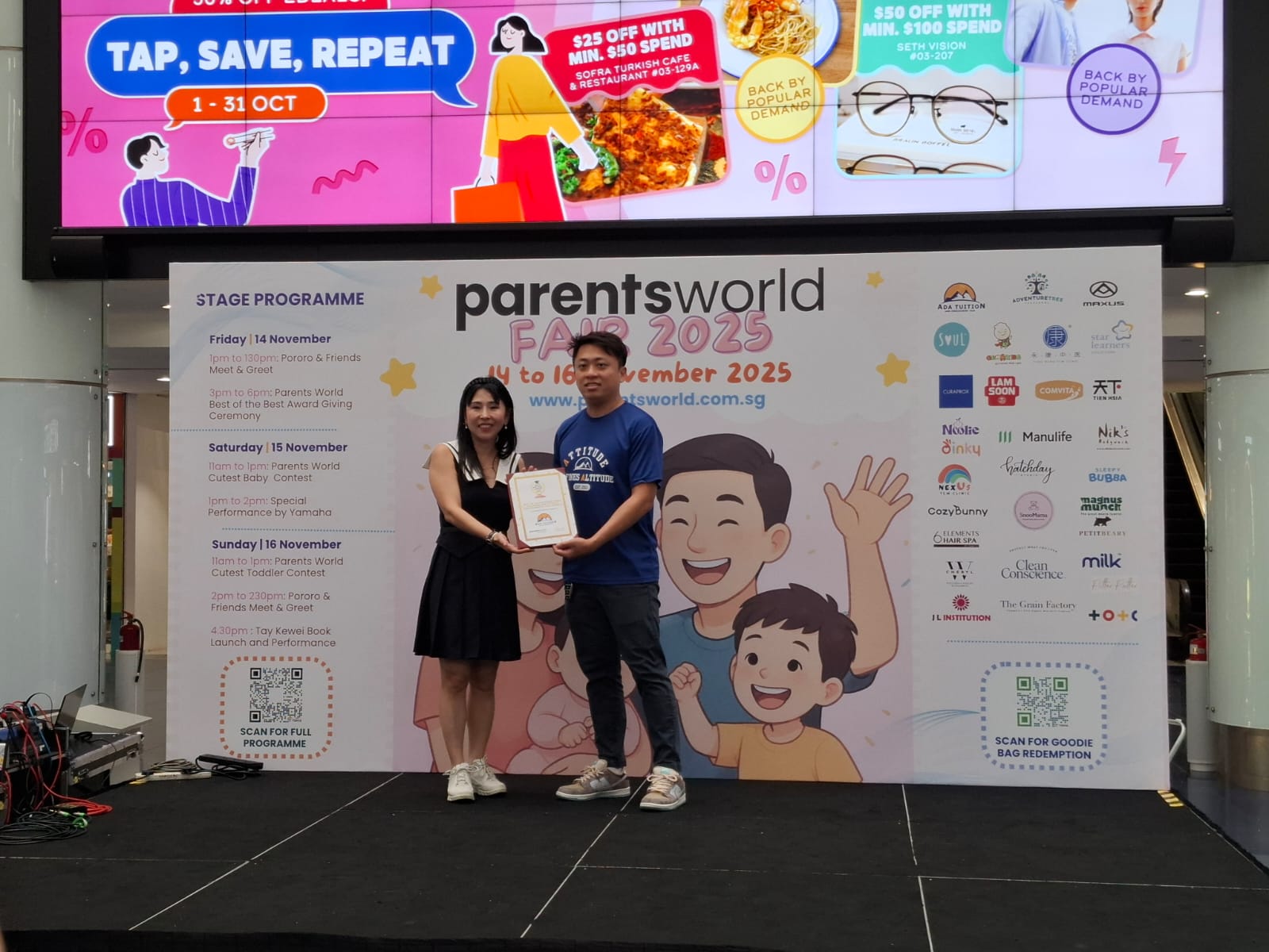 ADA Tuition receiving the Best in Transformational Learning award on stage at Parents World Fair 2025